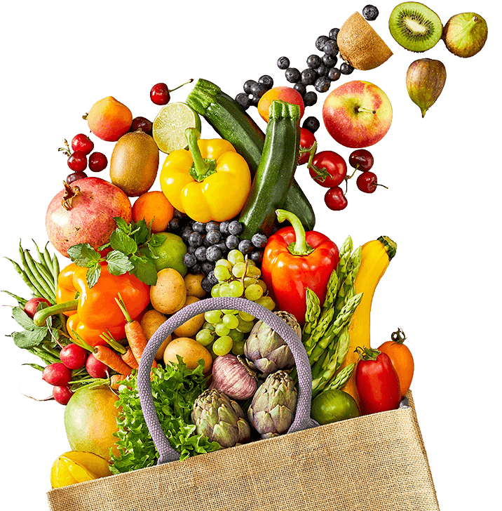 fruit and vegetables spilling out of a burlap bag
